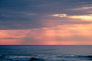 Naklejka premium sunset over the sea