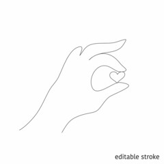 Obraz premium Hand with Little Heart in Linear Style. Sketchy Romantic Concept. Outline Simple Artwork with Editable Stroke. Vector Illustration.
