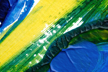 blue green yellow abstract acrylic painting color texture on white paper background by using rorschach inkblot method