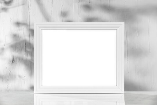 White picture frame and free space for your decoration 
