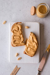 bread with peanut butter on the background