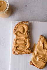 bread with peanut butter on the background