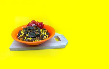 delicious food on yellow background	