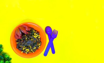 delicious food on yellow background	