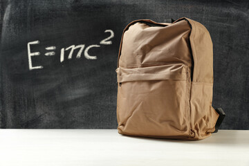 Blackboard and school backpack. Free space for your decoration 