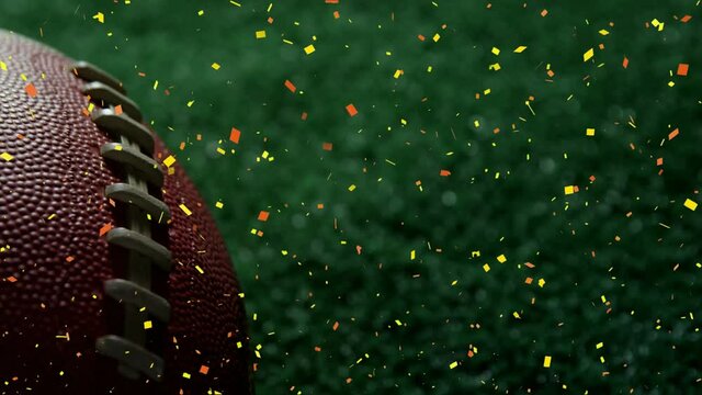 Animation of confetti falling over american football ball