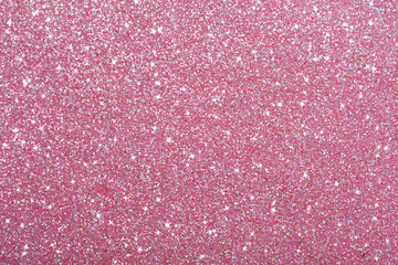 Beautiful shiny pink glitter as background, closeup