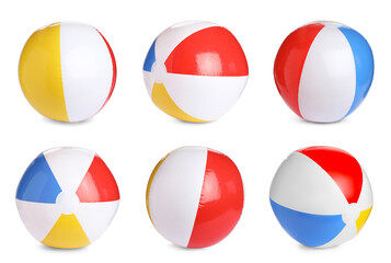 Set with bright inflatable balls on white background