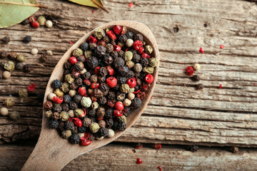 Pepper peas on wooden background