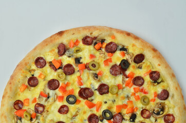 pizza with Cornish mushrooms, cheese and salami top view