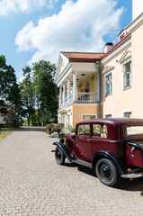 Car in Front of a House