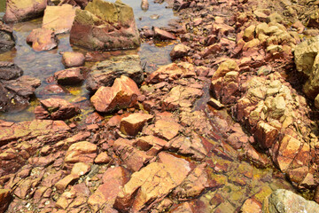 Rock Stones and Cristal Clear Water yellow Background