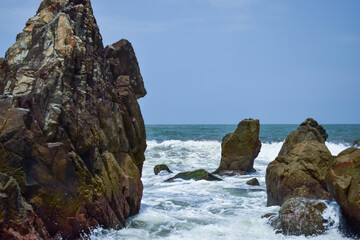 Ocean-Sea Waves, Mountains Rock Stones and Sky Blue Landscape Background