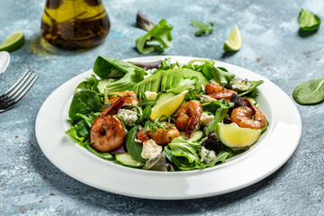 Seafood salad with avocado, blue cheese and smoked shrimps. Homemade vegetarian shrimp salad. banner, menu recipe place for text, top view