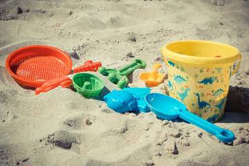 Fototapeta na wymiar Children toys for relax or playing on sand at beach. Vacation time