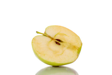 One half of a juicy apple, close-up, isolated on white.