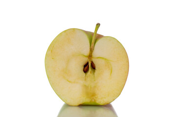 One half of a juicy apple, close-up, isolated on white.