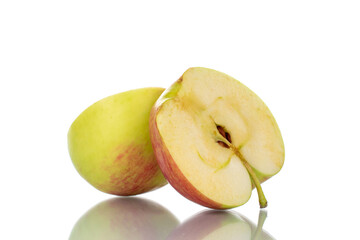 Two halves of a juicy apple, close-up, isolated on white.