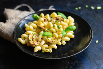zucchini pasta vegetables and macaroni no meat fresh portion ready to eat meal snack on the table copy space food background rustic. top view keto or paleo diet veggie vegan or vegetarian food
