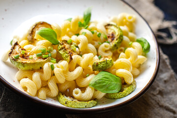 zucchini pasta vegetables and macaroni no meat fresh portion ready to eat meal snack on the table copy space food background rustic. top view keto or paleo diet veggie vegan or vegetarian food