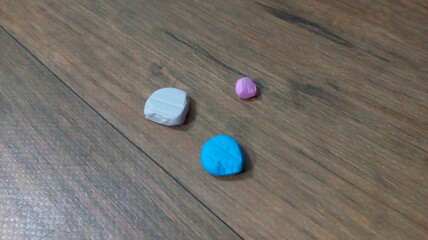 stones on a wooden background