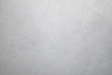 Beige colored tile texture or background