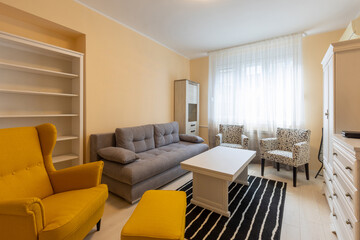 Interior of an apartment living room with furniture