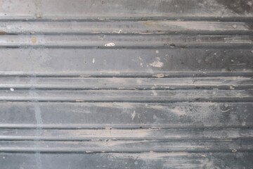 Stained grey metal close up