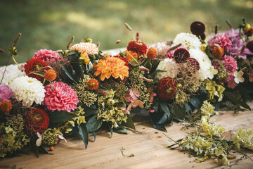 floristic composition on a wooden table, master class in the open air