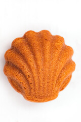 Madeleine cakes with a distinctive shell-like shape on white background for bakery, food and eating concept