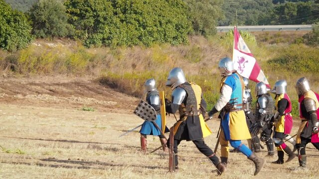 ALJUBARROT, PORTUGAL - Aug 17, 2017: The Medieval soldiers with their leader going into battle during the festival in Portugal