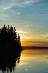 The Glowing Sun behind an Island