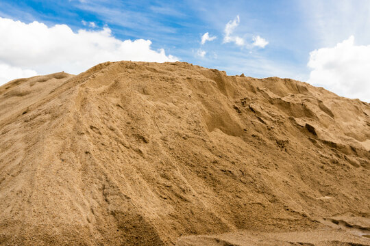 Coarse Sand pile and Find Granular Sand pile and fill Sand pile. used to make concrete  , to create  path , to create  floor. Sand texture , Sand  background and Sand isolated.