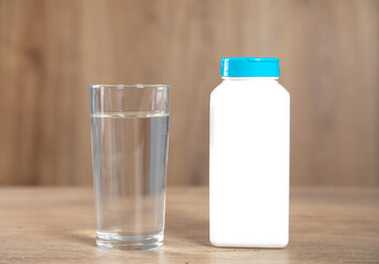 glass of water and drug