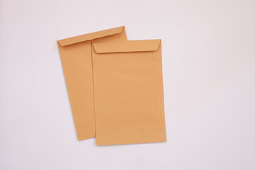 brown paper bag on white,brown envelope front and back isolated on white background. View from the letter.