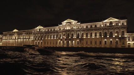 Fototapeta na wymiar Night architecture in St. Petersburg view from the ferry.