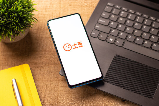 Assam, india - May 04, 2021 : Tudou.com logo on phone screen stock image.