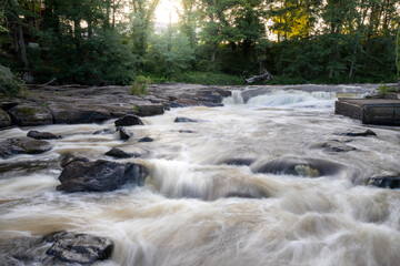 Morrum Salmon river in Sweden is known among fishing enthusiasts around the world because of the salmon fishing. Long exposure photo during golden hour.