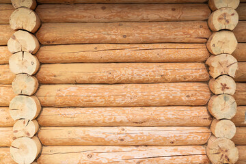 House wall in the village. Russian masonry of logs in the southern Urals.