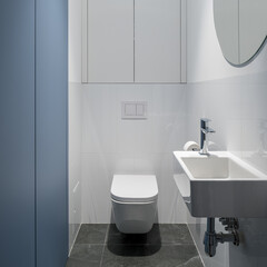 Simple lavatory with blue wall