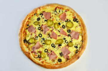 pizza with ham Cornish mushrooms, cheese and salami top view