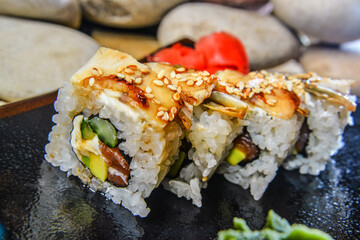 Sushi roll sushi with prawn, avocado, cream cheese, sesame. Sushi menu. Japanese food.