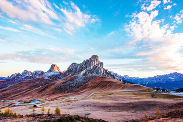 Breathtaking beautiful autumn landscape with famous alpine place Passo Giau mountains and Ra Gusela peak in the Dolomites, South Tyrol, Alps, Italy. Amazing places.