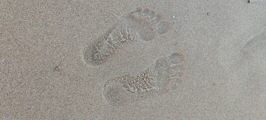 footprints on the sea sand. sand beach