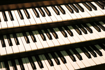Layers of keyboard of a pipe organ. Classical church organ