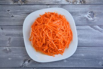 Korean food pickle on white plate closeup top view