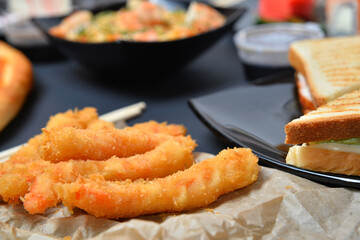 Fried Shrimps closeup ight and crispy crunchy parmesan bread crumbs coating Fried Shrimps