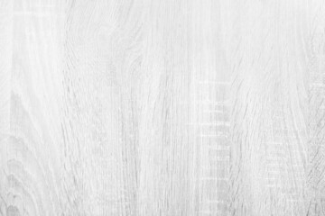 White wood texture background of distressed pine grain. Natural wooden texture wallpaper. White wooden table or cutting board top view.