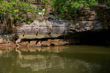 Fototapeta premium Crocodile cave on langkawi island. Tourist point, rock in the form of a crocodile's head