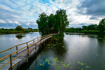 Fototapeta premium Aerial view of a fishing house on the lake